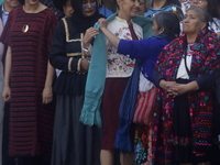 Claudia Sheinbaum (white jacket), President of Mexico, is at the National Palace in Mexico City, Mexico, during the announcement of the next...