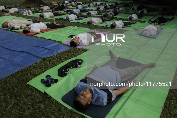 People meditate on World Diabetes Day in Dhaka, Bangladesh, on November 14, 2024. 