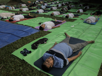 People meditate on World Diabetes Day in Dhaka, Bangladesh, on November 14, 2024. (