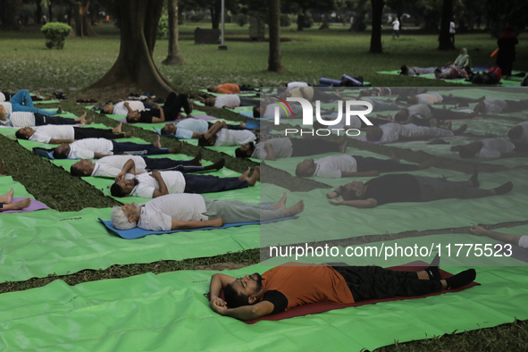 People meditate on World Diabetes Day in Dhaka, Bangladesh, on November 14, 2024. 