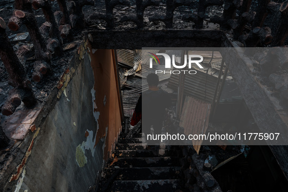 Residents and authorities survey the aftermath of a massive fire that ravages multiple factories in Sopore's Industrial Estate, Jammu and Ka...