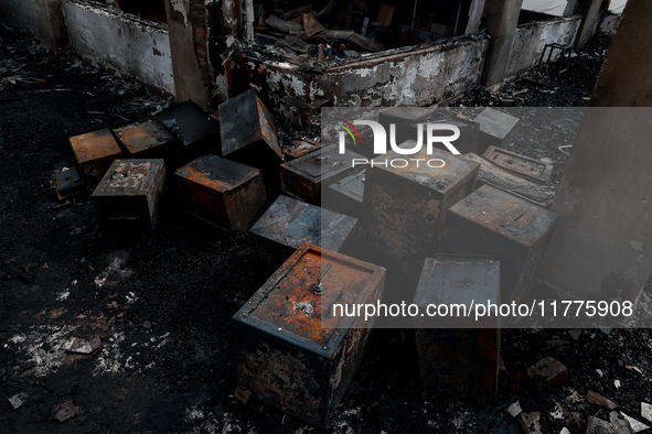 Residents and authorities survey the aftermath of a massive fire that ravages multiple factories in Sopore's Industrial Estate, Jammu and Ka...