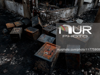 Residents and authorities survey the aftermath of a massive fire that ravages multiple factories in Sopore's Industrial Estate, Jammu and Ka...