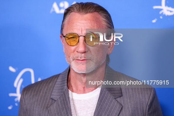 Daniel Craig arrives at the Los Angeles Premiere Of A24's 'Queer' held at the Directors Guild of America Theater Complex on November 13, 202...