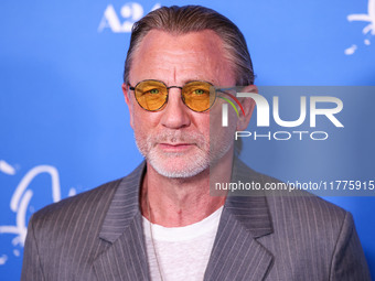 Daniel Craig arrives at the Los Angeles Premiere Of A24's 'Queer' held at the Directors Guild of America Theater Complex on November 13, 202...