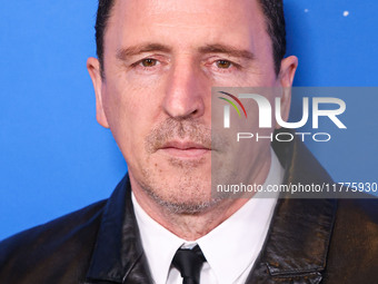 Atticus Ross arrives at the Los Angeles Premiere Of A24's 'Queer' held at the Directors Guild of America Theater Complex on November 13, 202...