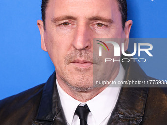 Atticus Ross arrives at the Los Angeles Premiere Of A24's 'Queer' held at the Directors Guild of America Theater Complex on November 13, 202...