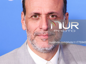 Luca Guadagnino arrives at the Los Angeles Premiere Of A24's 'Queer' held at the Directors Guild of America Theater Complex on November 13,...