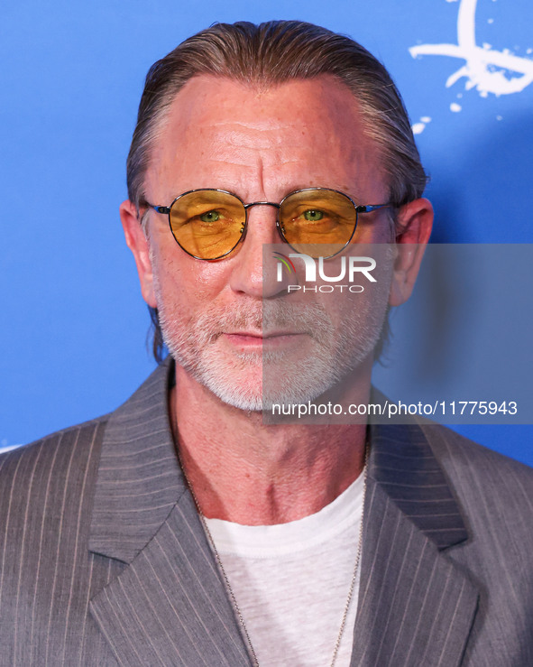 Daniel Craig arrives at the Los Angeles Premiere Of A24's 'Queer' held at the Directors Guild of America Theater Complex on November 13, 202...