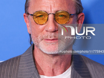 Daniel Craig arrives at the Los Angeles Premiere Of A24's 'Queer' held at the Directors Guild of America Theater Complex on November 13, 202...