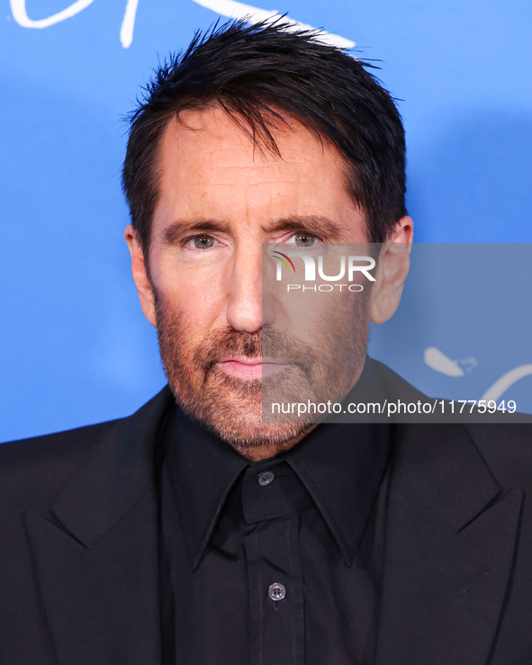 Trent Reznor arrives at the Los Angeles Premiere Of A24's 'Queer' held at the Directors Guild of America Theater Complex on November 13, 202...