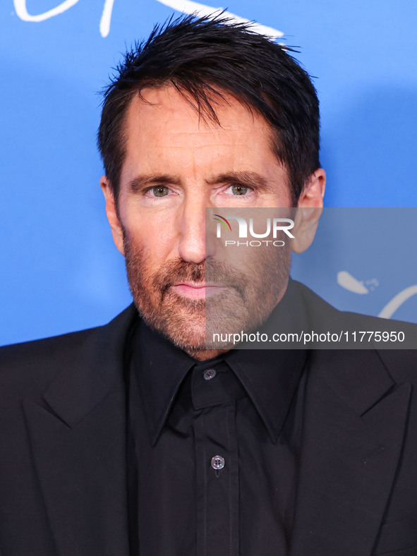 Trent Reznor arrives at the Los Angeles Premiere Of A24's 'Queer' held at the Directors Guild of America Theater Complex on November 13, 202...