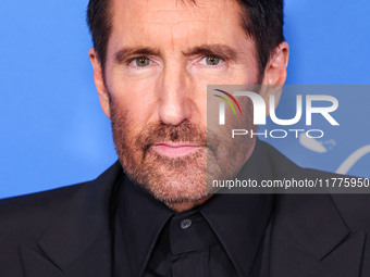 Trent Reznor arrives at the Los Angeles Premiere Of A24's 'Queer' held at the Directors Guild of America Theater Complex on November 13, 202...