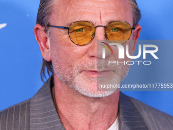 Daniel Craig arrives at the Los Angeles Premiere Of A24's 'Queer' held at the Directors Guild of America Theater Complex on November 13, 202...