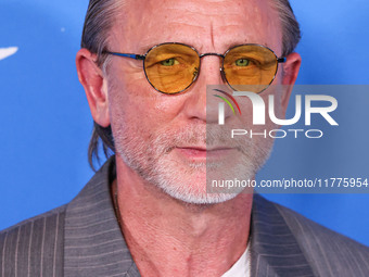 Daniel Craig arrives at the Los Angeles Premiere Of A24's 'Queer' held at the Directors Guild of America Theater Complex on November 13, 202...