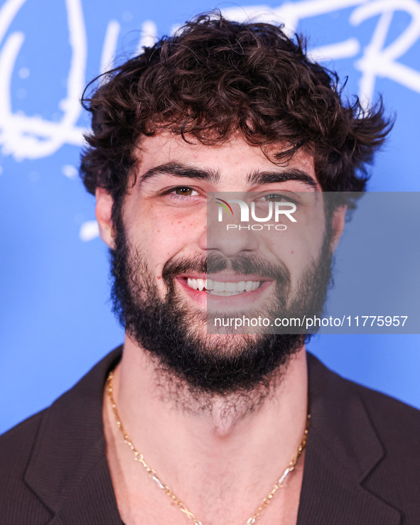 Noah Centineo arrives at the Los Angeles Premiere Of A24's 'Queer' held at the Directors Guild of America Theater Complex on November 13, 20...