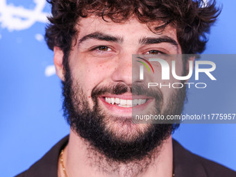 Noah Centineo arrives at the Los Angeles Premiere Of A24's 'Queer' held at the Directors Guild of America Theater Complex on November 13, 20...