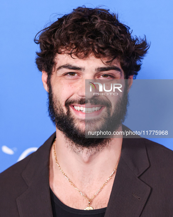 Noah Centineo arrives at the Los Angeles Premiere Of A24's 'Queer' held at the Directors Guild of America Theater Complex on November 13, 20...