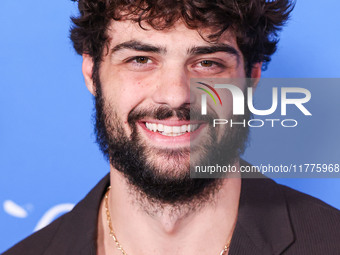 Noah Centineo arrives at the Los Angeles Premiere Of A24's 'Queer' held at the Directors Guild of America Theater Complex on November 13, 20...