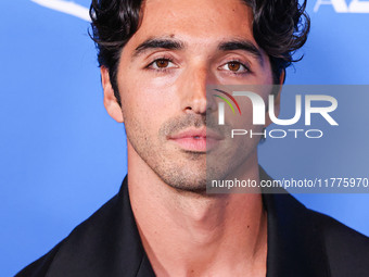 Taylor Zakhar Perez arrives at the Los Angeles Premiere Of A24's 'Queer' held at the Directors Guild of America Theater Complex on November...