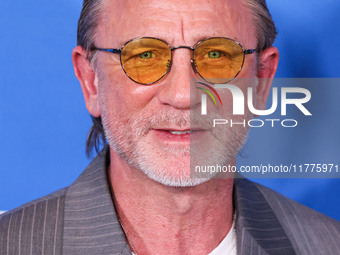 Daniel Craig arrives at the Los Angeles Premiere Of A24's 'Queer' held at the Directors Guild of America Theater Complex on November 13, 202...