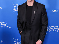 Drew Starkey arrives at the Los Angeles Premiere Of A24's 'Queer' held at the Directors Guild of America Theater Complex on November 13, 202...