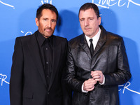 Trent Reznor and Atticus Ross arrive at the Los Angeles Premiere Of A24's 'Queer' held at the Directors Guild of America Theater Complex on...