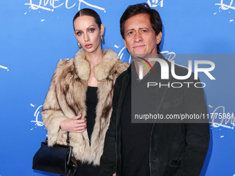 Bailey Mikel and Clifton Collins Jr. arrive at the Los Angeles Premiere Of A24's 'Queer' held at the Directors Guild of America Theater Comp...