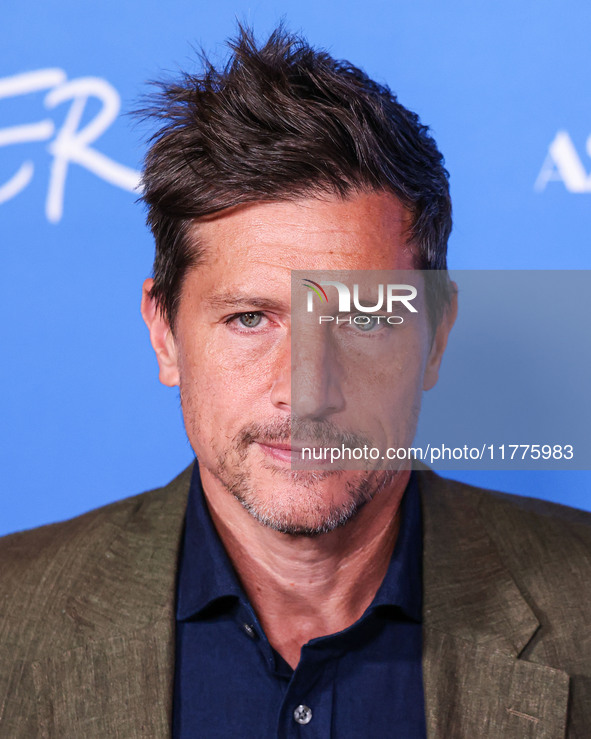 Simon Rex arrives at the Los Angeles Premiere Of A24's 'Queer' held at the Directors Guild of America Theater Complex on November 13, 2024 i...