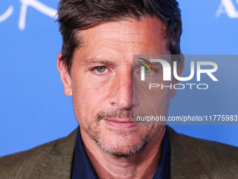 Simon Rex arrives at the Los Angeles Premiere Of A24's 'Queer' held at the Directors Guild of America Theater Complex on November 13, 2024 i...