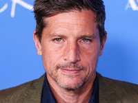 Simon Rex arrives at the Los Angeles Premiere Of A24's 'Queer' held at the Directors Guild of America Theater Complex on November 13, 2024 i...