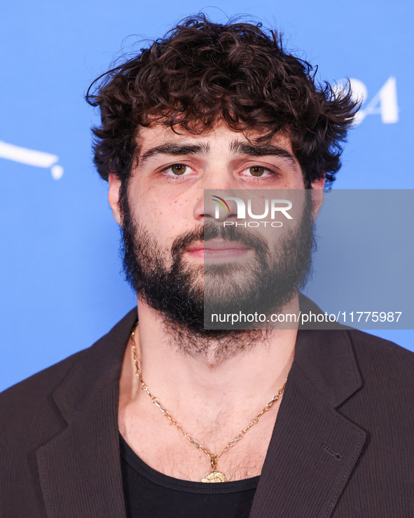 Noah Centineo arrives at the Los Angeles Premiere Of A24's 'Queer' held at the Directors Guild of America Theater Complex on November 13, 20...