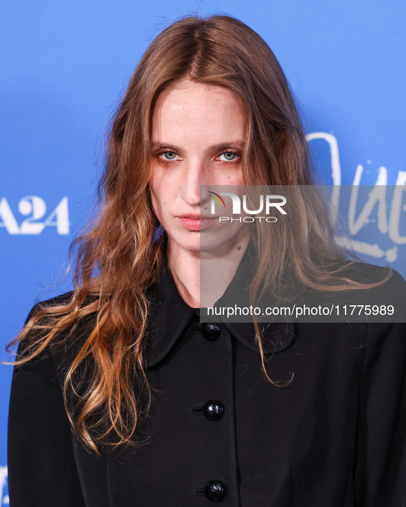 Petra Collins arrives at the Los Angeles Premiere Of A24's 'Queer' held at the Directors Guild of America Theater Complex on November 13, 20...