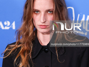 Petra Collins arrives at the Los Angeles Premiere Of A24's 'Queer' held at the Directors Guild of America Theater Complex on November 13, 20...