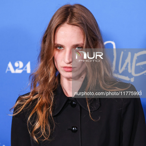 Petra Collins arrives at the Los Angeles Premiere Of A24's 'Queer' held at the Directors Guild of America Theater Complex on November 13, 20...