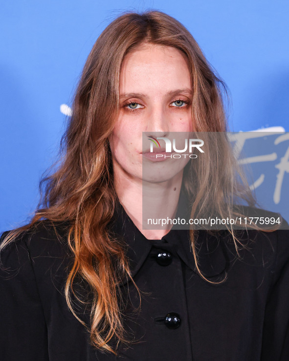 Petra Collins arrives at the Los Angeles Premiere Of A24's 'Queer' held at the Directors Guild of America Theater Complex on November 13, 20...