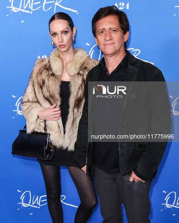 Bailey Mikel and Clifton Collins Jr. arrive at the Los Angeles Premiere Of A24's 'Queer' held at the Directors Guild of America Theater Comp...