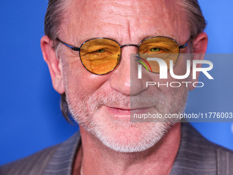 Daniel Craig arrives at the Los Angeles Premiere Of A24's 'Queer' held at the Directors Guild of America Theater Complex on November 13, 202...