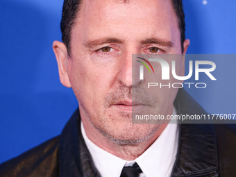 Atticus Ross arrives at the Los Angeles Premiere Of A24's 'Queer' held at the Directors Guild of America Theater Complex on November 13, 202...