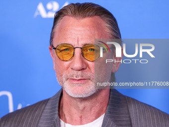 Daniel Craig arrives at the Los Angeles Premiere Of A24's 'Queer' held at the Directors Guild of America Theater Complex on November 13, 202...