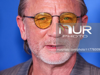 Daniel Craig arrives at the Los Angeles Premiere Of A24's 'Queer' held at the Directors Guild of America Theater Complex on November 13, 202...