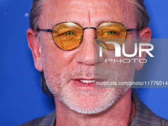 Daniel Craig arrives at the Los Angeles Premiere Of A24's 'Queer' held at the Directors Guild of America Theater Complex on November 13, 202...