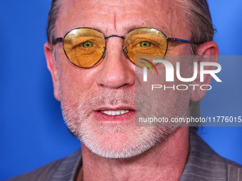 Daniel Craig arrives at the Los Angeles Premiere Of A24's 'Queer' held at the Directors Guild of America Theater Complex on November 13, 202...