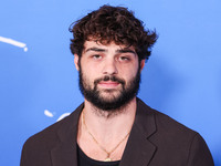 Noah Centineo arrives at the Los Angeles Premiere Of A24's 'Queer' held at the Directors Guild of America Theater Complex on November 13, 20...