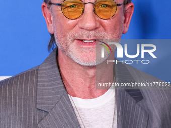 Daniel Craig arrives at the Los Angeles Premiere Of A24's 'Queer' held at the Directors Guild of America Theater Complex on November 13, 202...