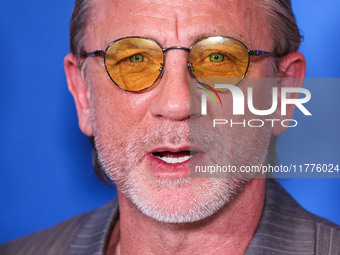 Daniel Craig arrives at the Los Angeles Premiere Of A24's 'Queer' held at the Directors Guild of America Theater Complex on November 13, 202...