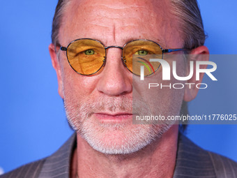 Daniel Craig arrives at the Los Angeles Premiere Of A24's 'Queer' held at the Directors Guild of America Theater Complex on November 13, 202...