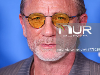 Daniel Craig arrives at the Los Angeles Premiere Of A24's 'Queer' held at the Directors Guild of America Theater Complex on November 13, 202...