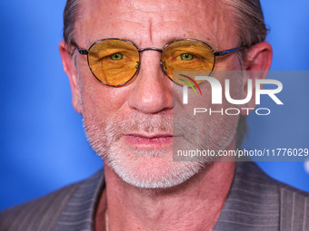 Daniel Craig arrives at the Los Angeles Premiere Of A24's 'Queer' held at the Directors Guild of America Theater Complex on November 13, 202...