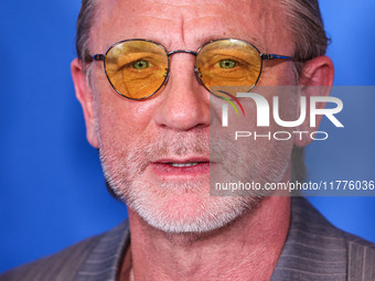 Daniel Craig arrives at the Los Angeles Premiere Of A24's 'Queer' held at the Directors Guild of America Theater Complex on November 13, 202...